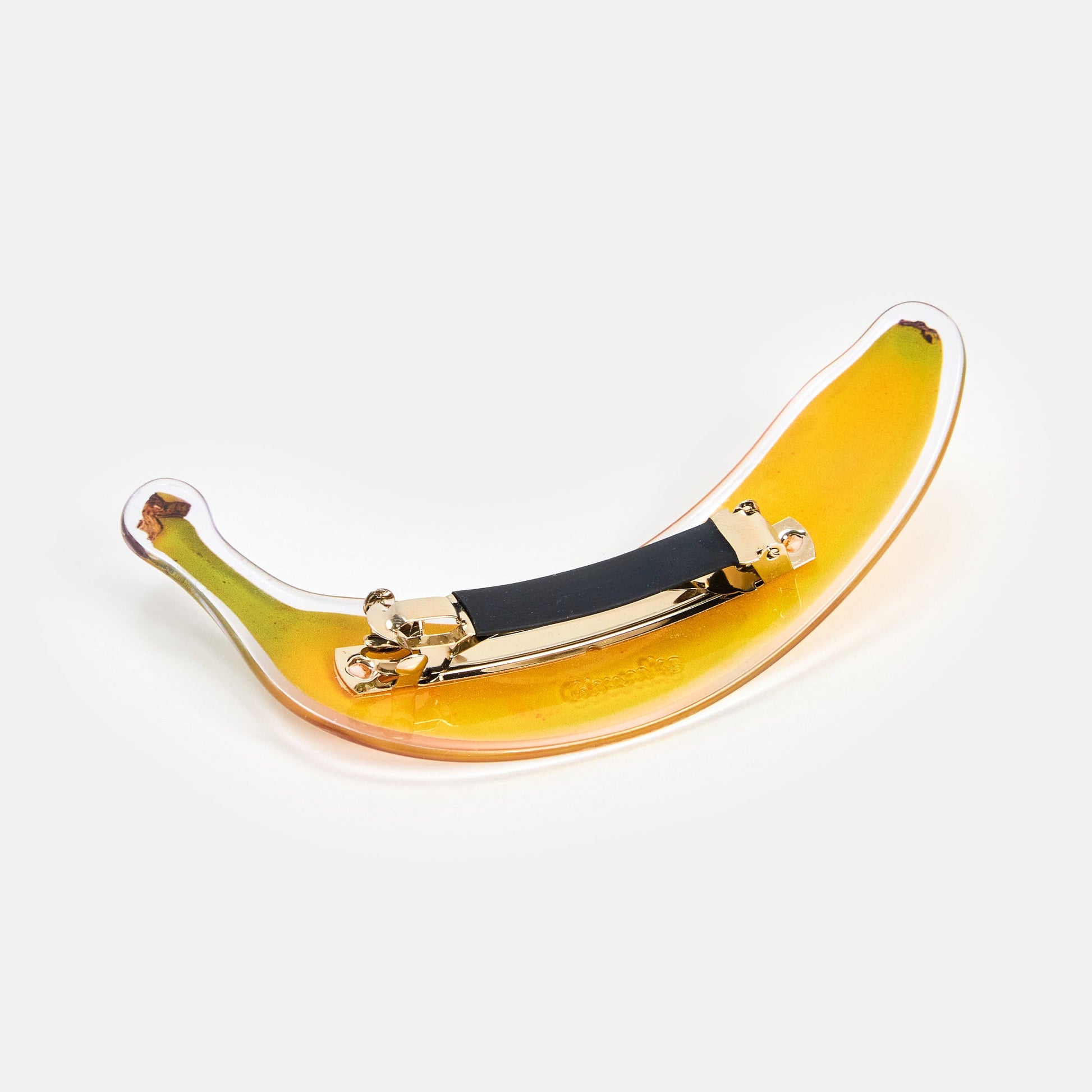 Hair Barrette with printed banana design on a white background.