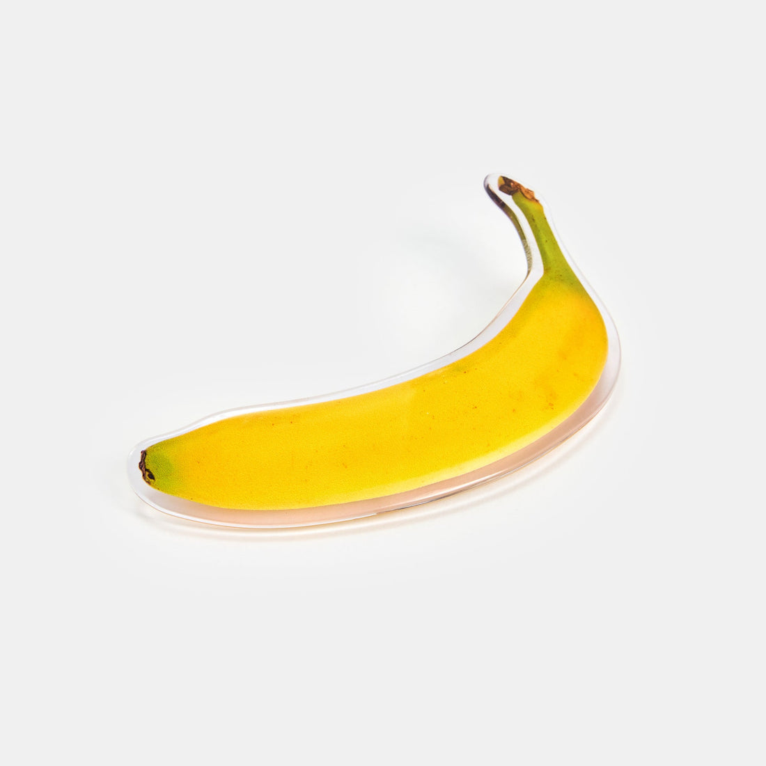 Hair Barrette with printed banana design on a white background.