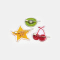 Hair clasps with kiwi, starfruit and cherries print design on a white background